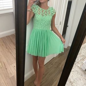 Mint green from an Australian boutique. Fits small